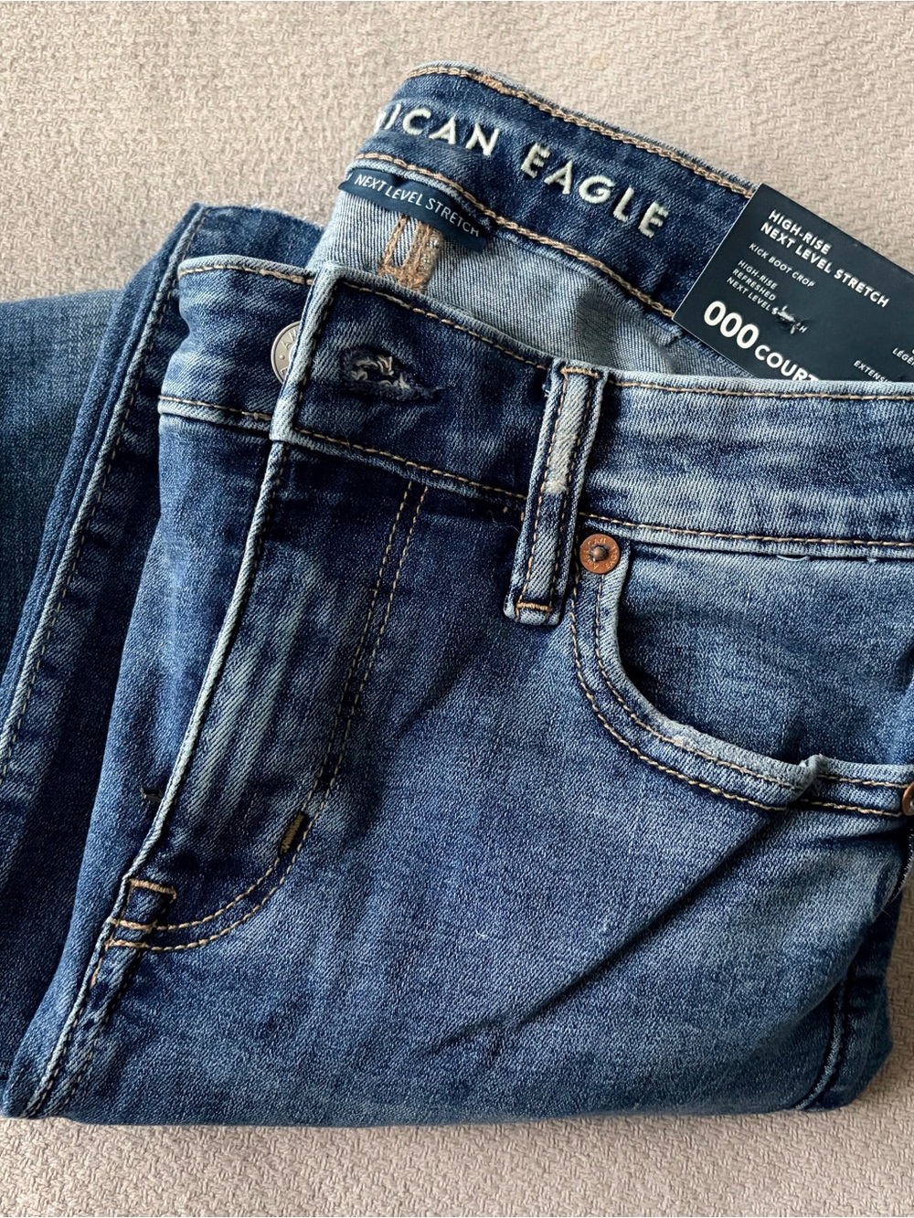 American Eagle Outfitters Next Level High-Waisted Kick Bootcut Crop Jean